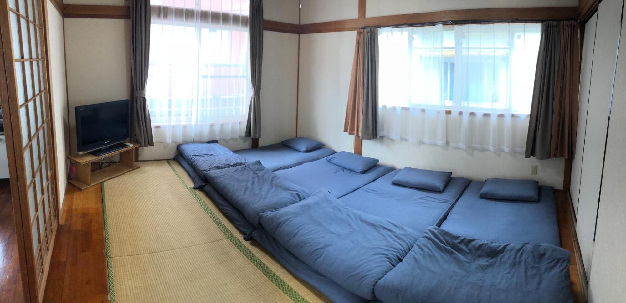 Golden Mile Apartment Amami Exterior foto
